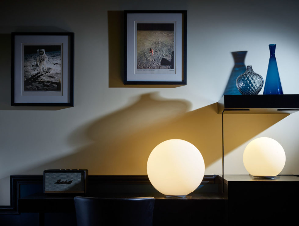 Detail of Moonlanding themed room at 47 Boutique Hotel with blue interior, and original NASA photographs from the 1960s