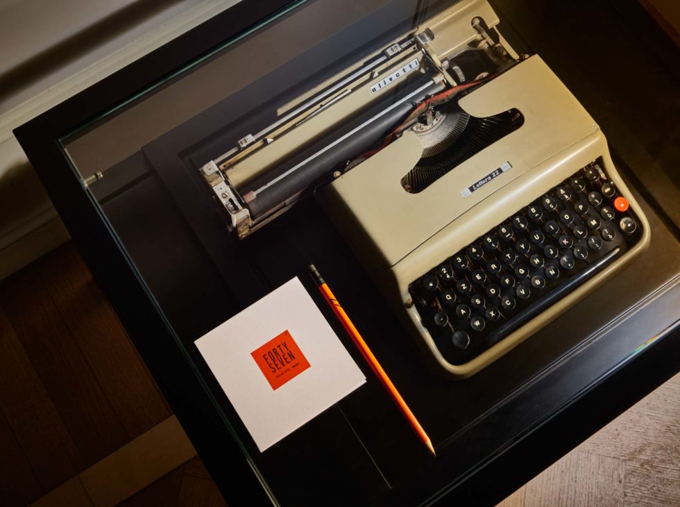Detail of Italian design room at 47 Boutique Hotel with Olivetti Lettera 22 typewriter by Marcello Nizzoli in a glass bedside